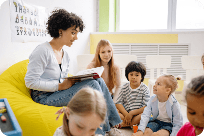 teacher-sittings-with-kids